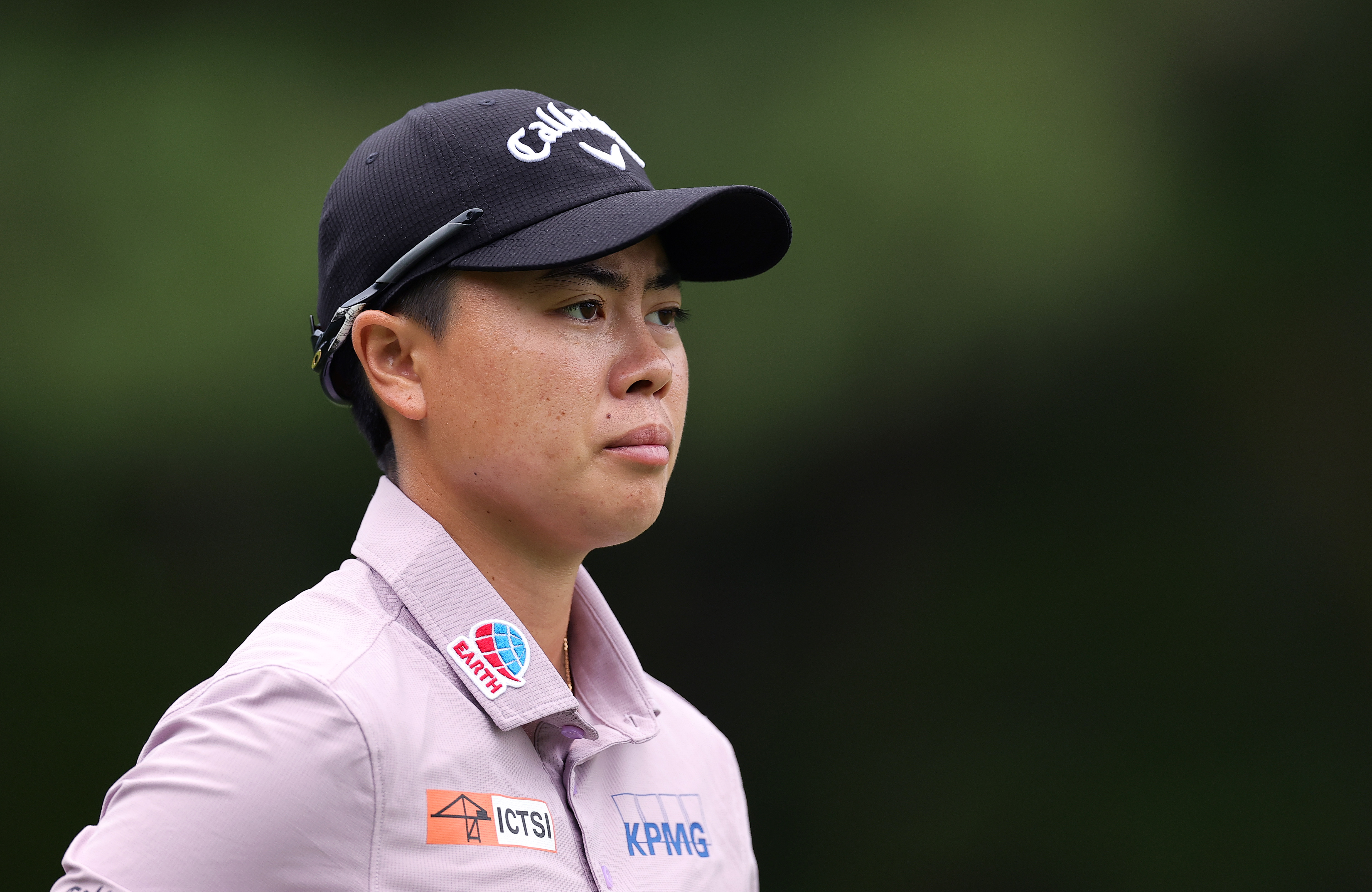 Yuka Saso stares on as she waits to tee off