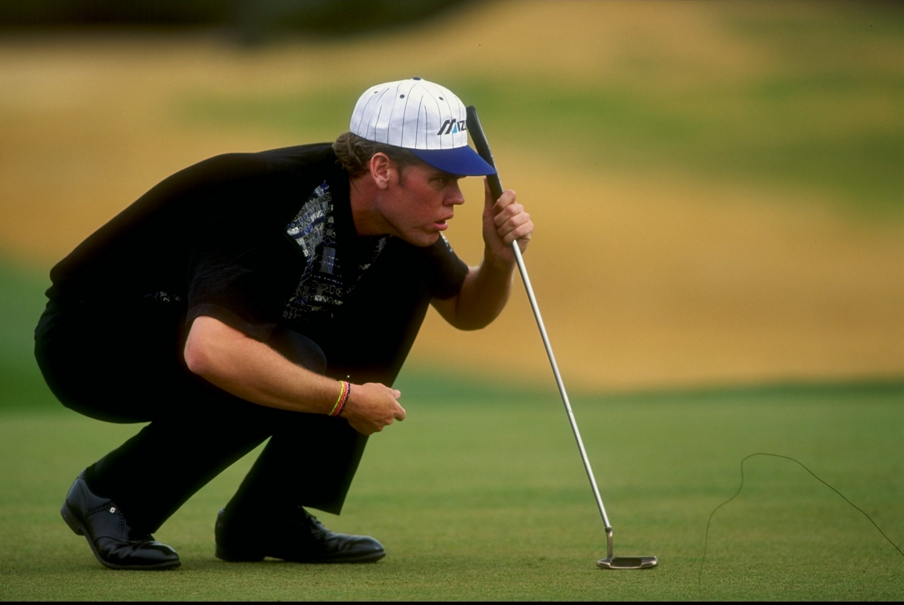 Jay Delsing lines up a putt