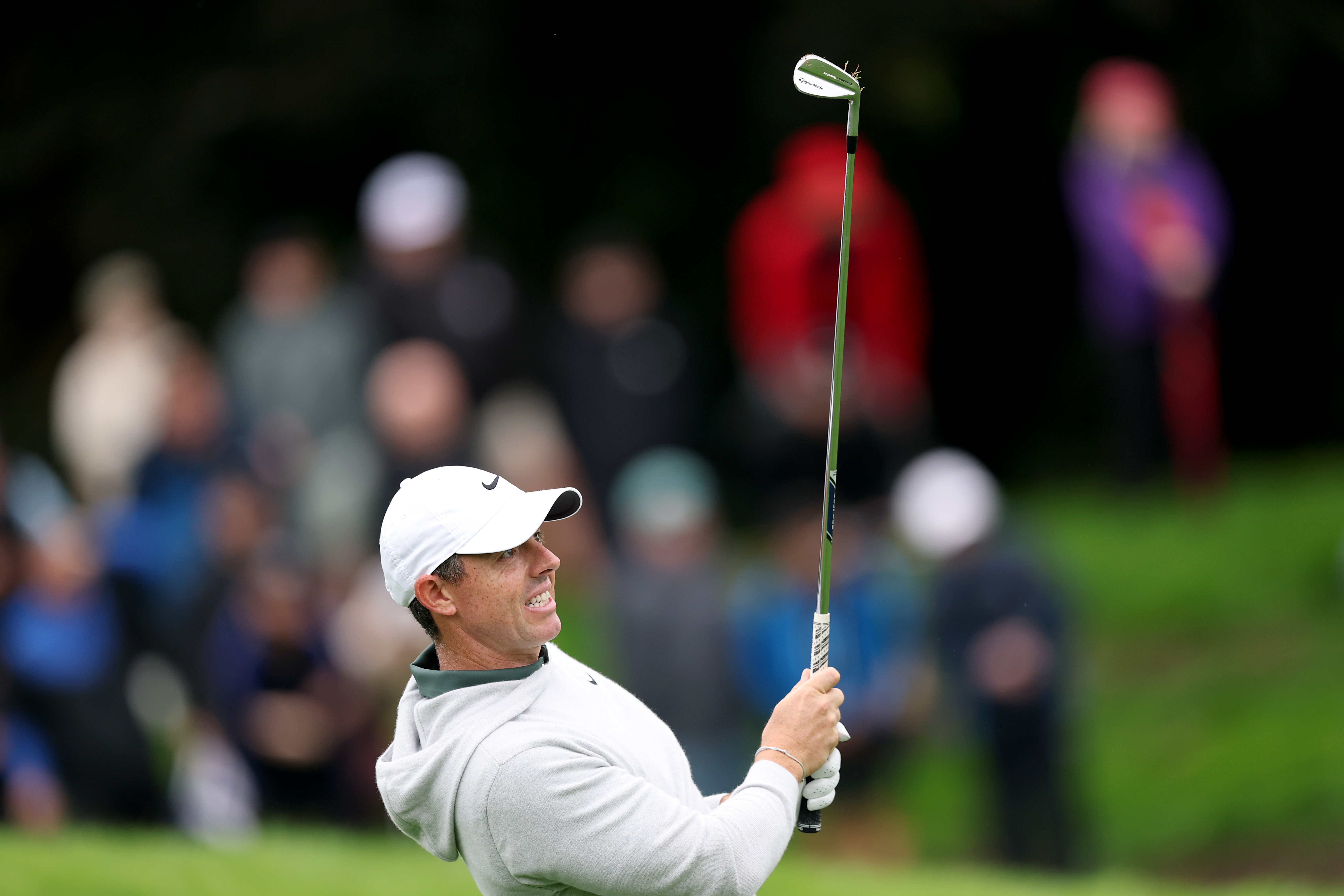 Rory McIlroy hits an iron shot