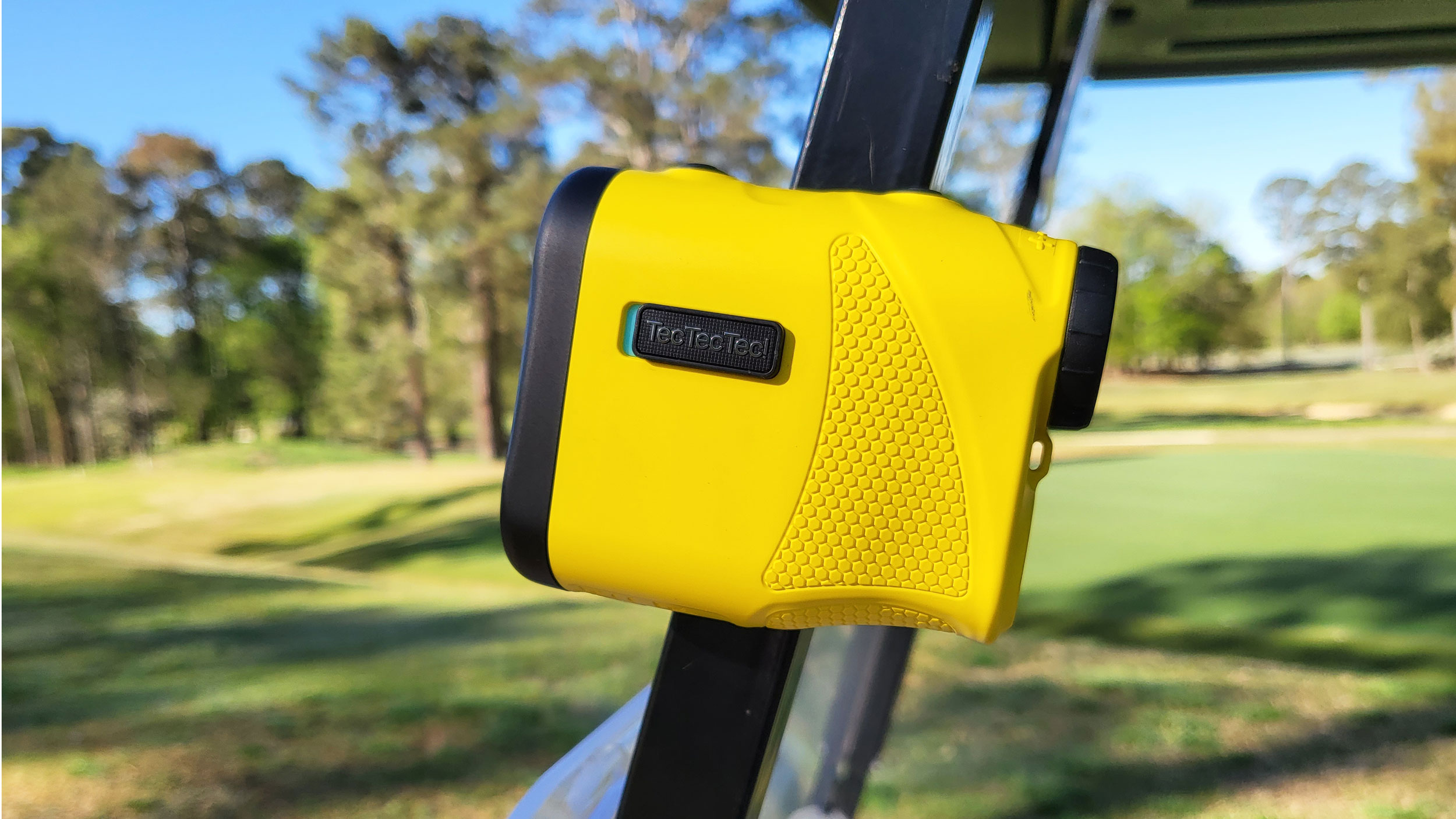 TecTecTec KLYR Laser Rangefinder mounted on a golf cart
