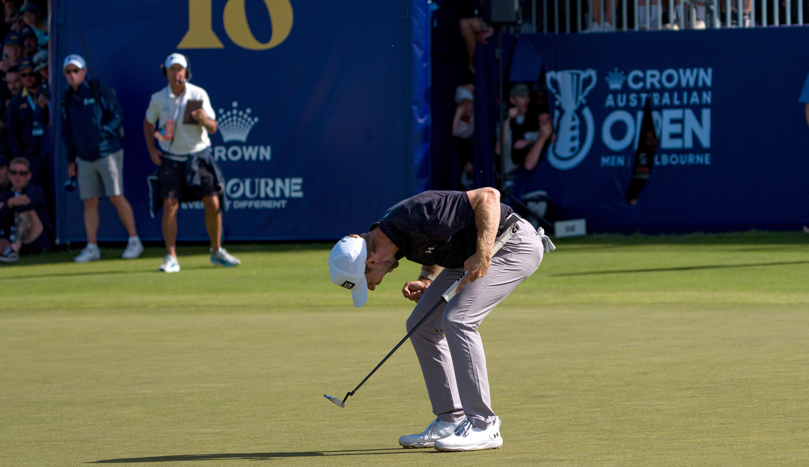 Rasmus Neergaard-Petersen shouts after holing the winning putt