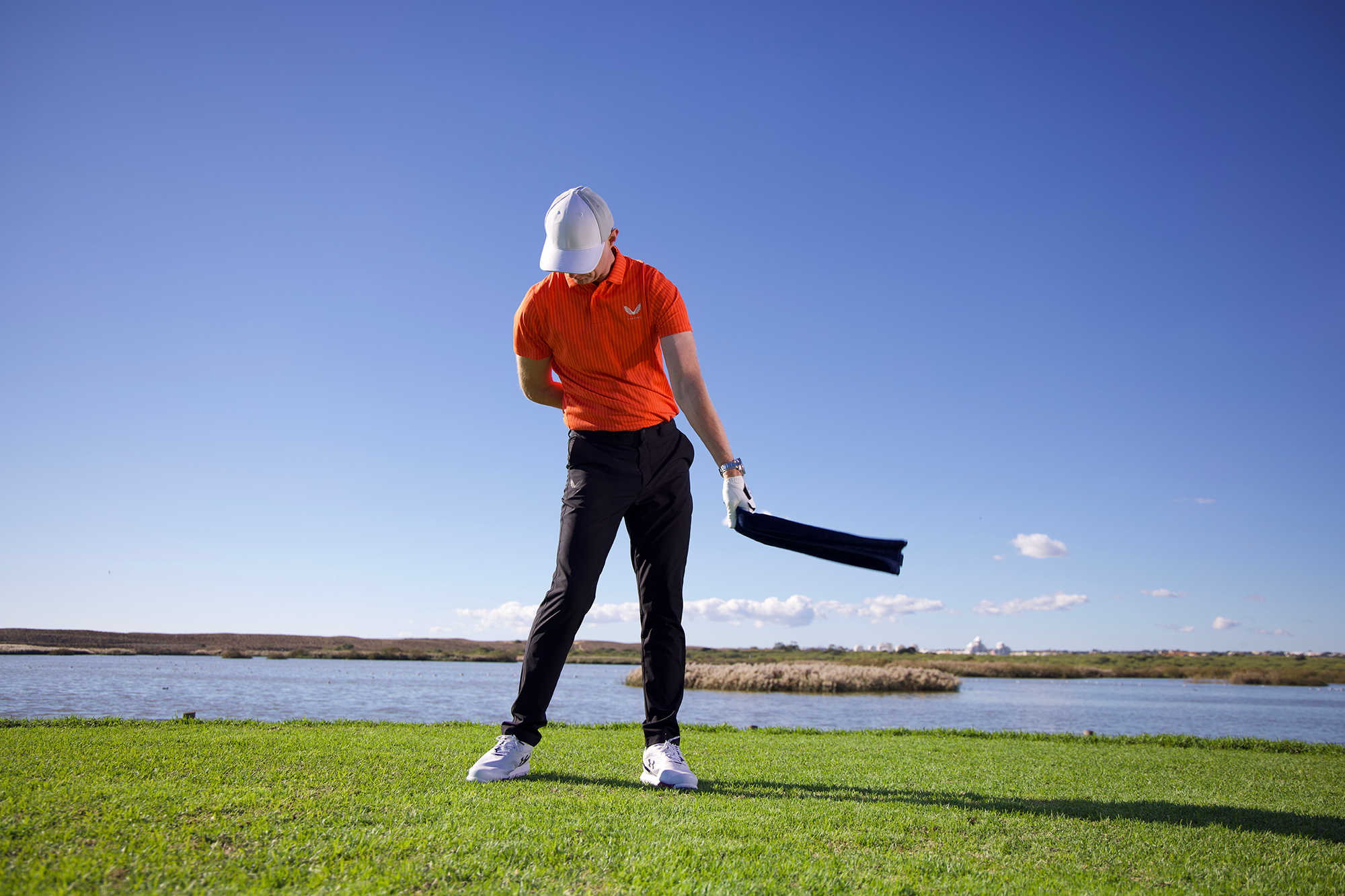 Ged Walters demonstrating the towel drill to help you make a committed swing and get your path correct rather than performing an over the top swing